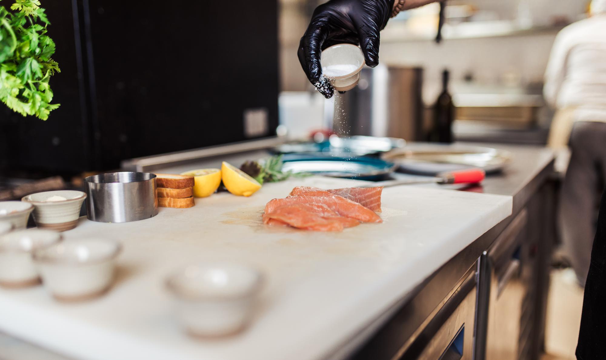 Studio counter with sous-vide equipment and plated courses